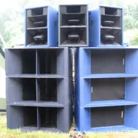 Two large blue speaker stacks with smaller cabinets on top
